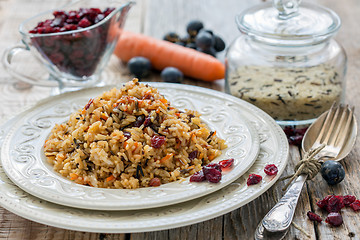 Image showing Pilaf with raisins, carrots and cranberries.