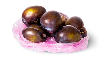 Image showing Whole violet plums in plastic bag