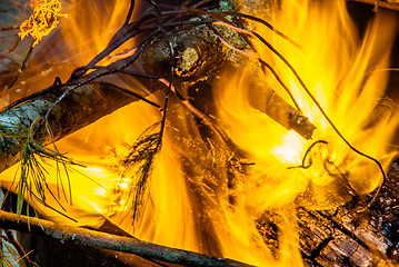 Image showing camp fire flames burning at night after hike