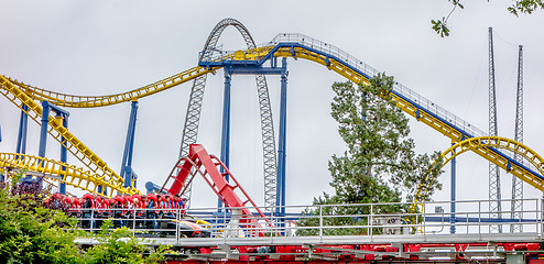 Image showing crazy rollercoaster rides at amusement park