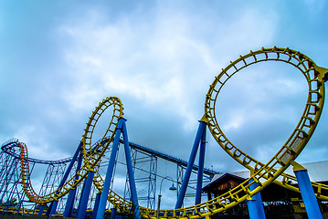 Image showing crazy rollercoaster rides at amusement park