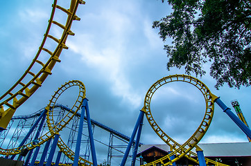 Image showing crazy rollercoaster rides at amusement park