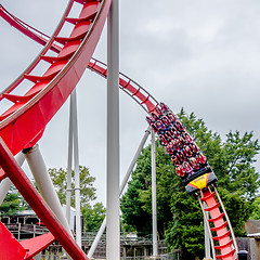 Image showing crazy rollercoaster rides at amusement park