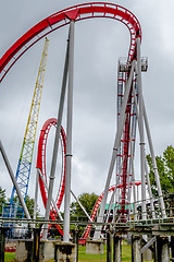 Image showing crazy rollercoaster rides at amusement park