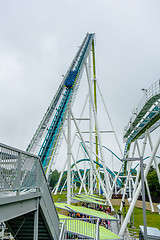 Image showing crazy rollercoaster rides at amusement park