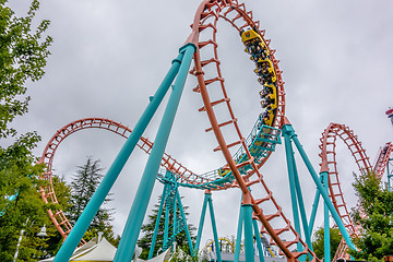 Image showing crazy rollercoaster rides at amusement park