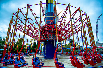 Image showing crazy rollercoaster rides at amusement park