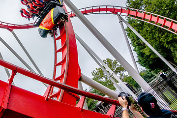 Image showing crazy rollercoaster rides at amusement park