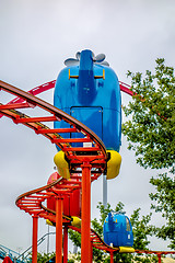 Image showing kiddie helicopter amusement ride at the park