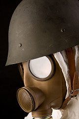 Image showing Military person in gas mask and helmet