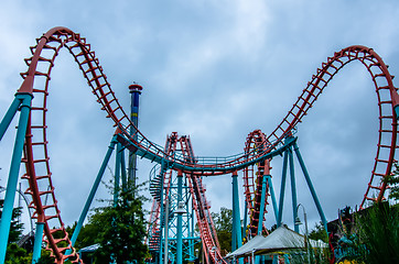 Image showing crazy rollercoaster rides at amusement park