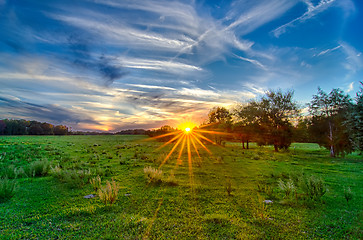Image showing sun setting over country farm land in york south carolina