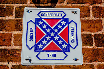 Image showing confederate flag plaque attached to brick wall