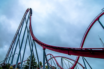 Image showing crazy rollercoaster rides at amusement park