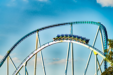 Image showing crazy rollercoaster rides at amusement park