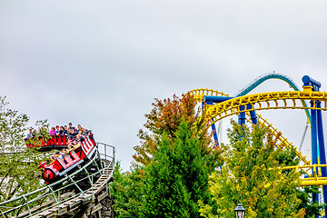 Image showing crazy rollercoaster rides at amusement park