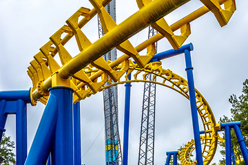 Image showing crazy rollercoaster rides at amusement park