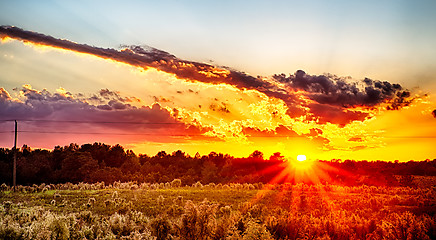 Image showing sun setting over country farm land in york south carolina