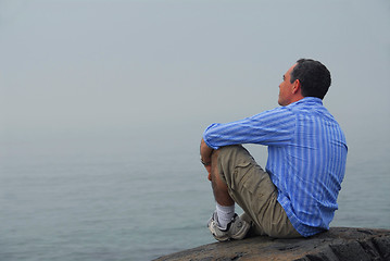 Image showing Man looking fog