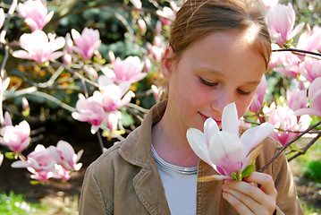 Image showing Girl with magnolia