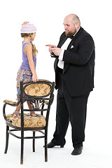 Image showing Little Girl and Servant in Tuxedo Have Fun