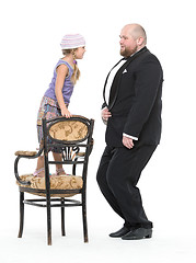 Image showing Little Girl and Servant in Tuxedo Have Fun