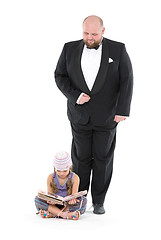 Image showing Little Girl and Servant in Tuxedo