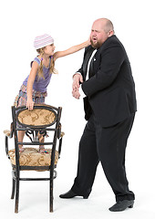 Image showing Little Girl and Servant in Tuxedo Have Fun