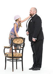 Image showing Little Girl and Servant in Tuxedo Have Fun