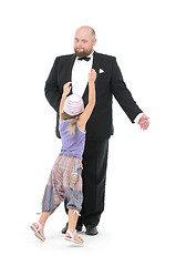 Image showing Little Girl and Servant in Tuxedo Have Fun