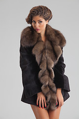 Image showing Young Beautiful Woman In a Fur Coat