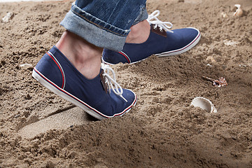 Image showing Man\'s Legs And Footprint On The Sand