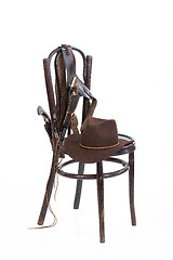 Image showing Old Chair And Cowboy Belt