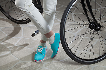 Image showing Woman\'s Legs And Bicycle