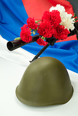 Image showing Machinegun And Flowers