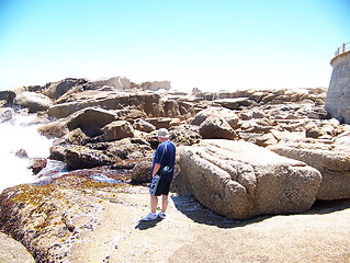 Image showing Man on rocks