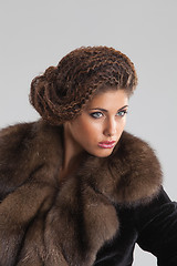 Image showing Young Beautiful Woman In a Fur Coat