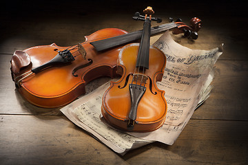 Image showing Two Violins And Sheet Music