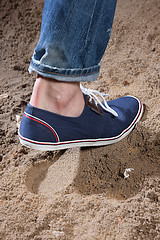 Image showing Man\'s Legs And Footprint On The Sand