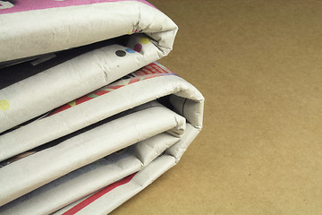 Image showing pile of daily newspapers