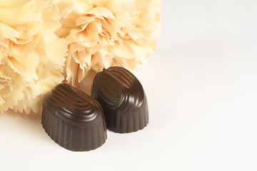 Image showing chocolates and carnations