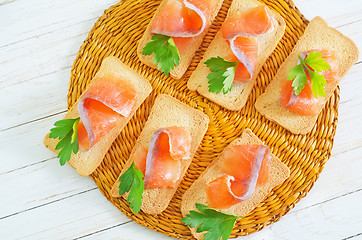 Image showing toasts with salmon and parsley