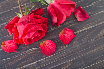 Image showing rose on wooden background