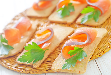 Image showing toasts with salmon and parsley