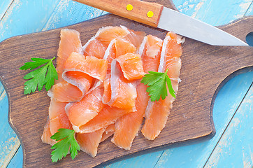 Image showing salmon on board