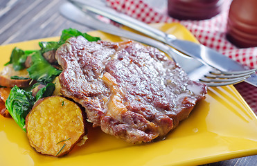 Image showing baked meat and salad