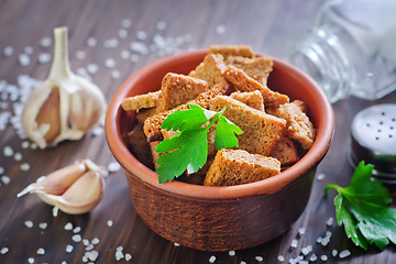 Image showing toasts with salt and garlic