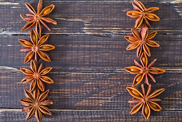 Image showing anise on wooden board