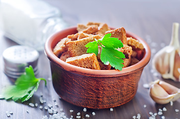 Image showing toasts with salt and garlic