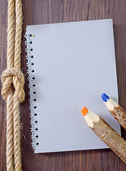 Image showing note and pencils